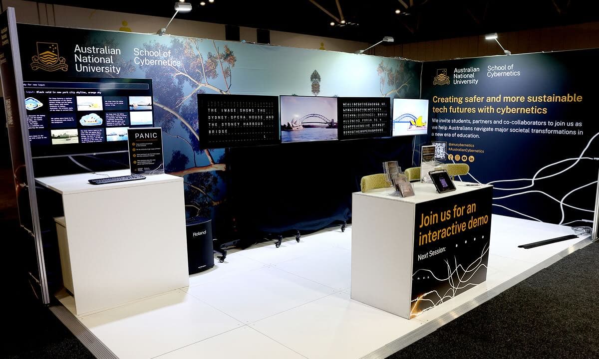 The PANIC! booth at SXSW, showcasing the installation with vibrant screens and interactive elements