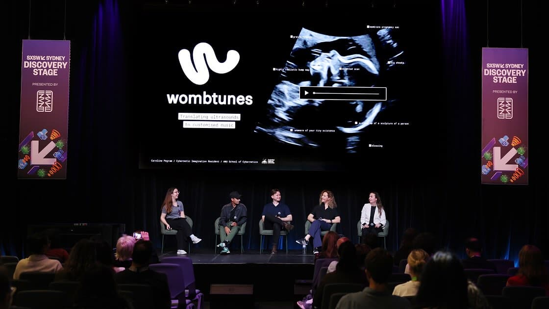 A photo of the SXSW panel where WombTunes was presented.